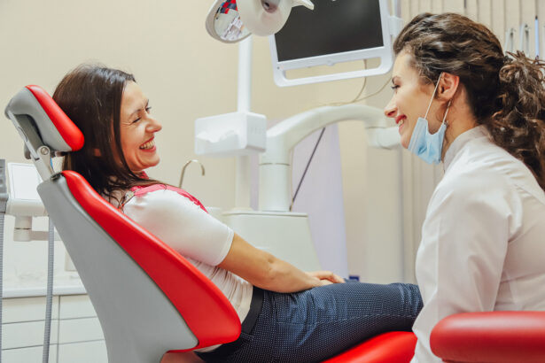 Root Canal or Extraction A patient is a young woman at a dentists appointment. During this time he sits in a dental chair and talks to a doctor. A doctor is a positive young beautiful woman.
